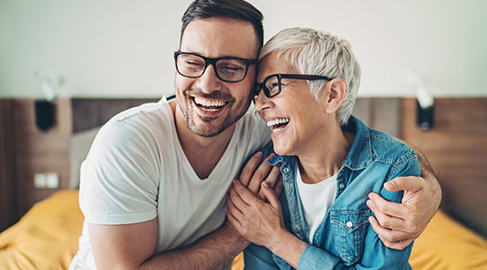 Man and woman laughing