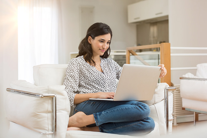 Woman looking at a laptop